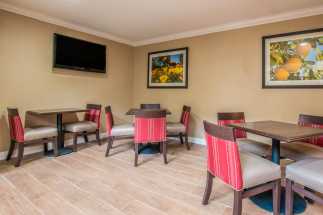 Quality Inn Downey - Breakfast Lounge with Flat Panel TV